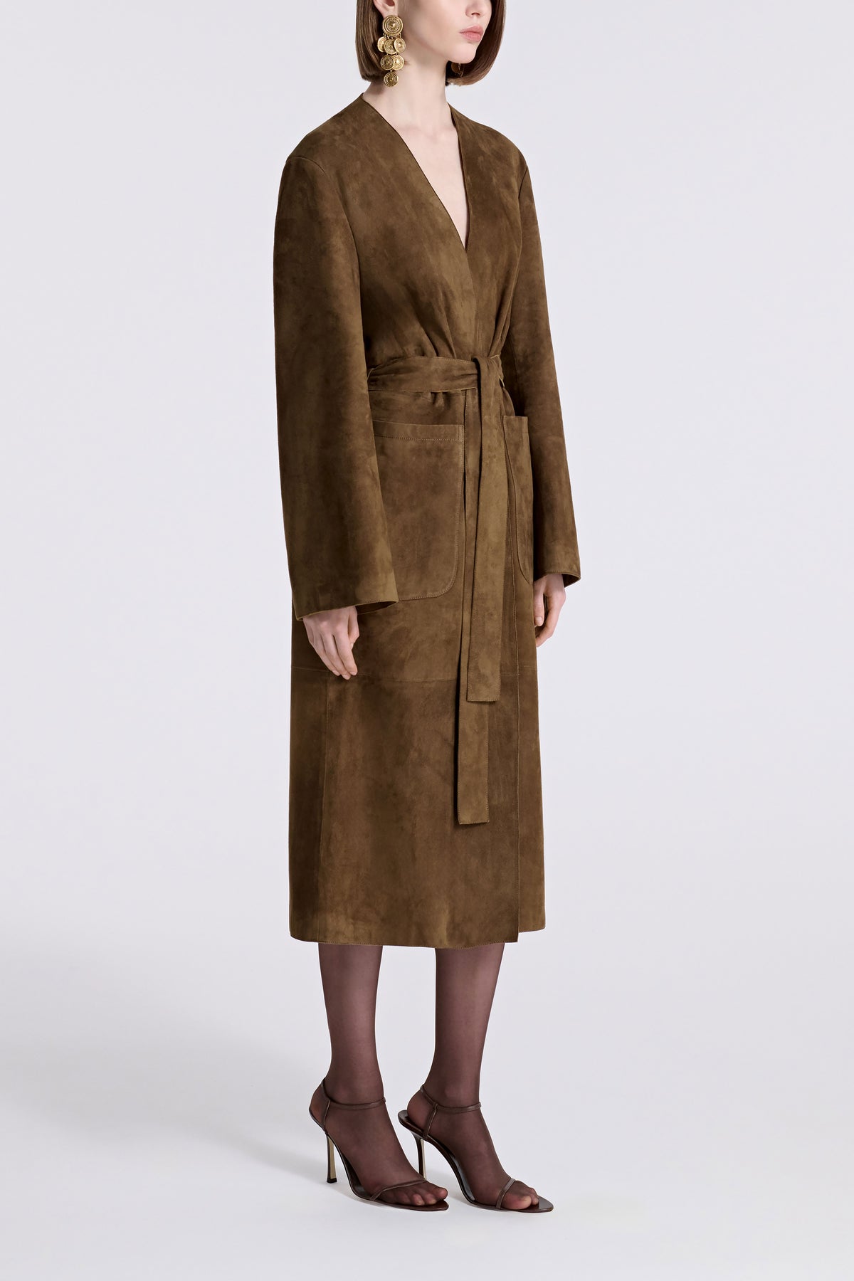 Model is Wearing Nour Hammour Ruelle Collarless Suede Trench Bark - Three Quarters