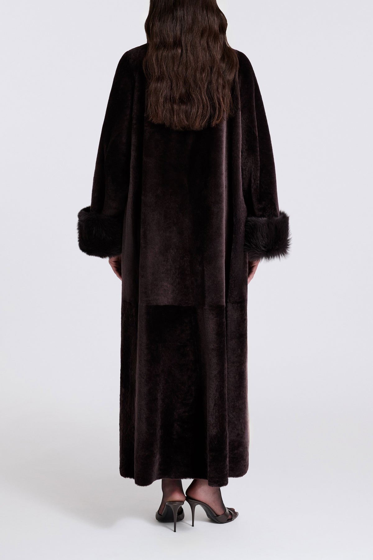 Model is Wearing Nour Hammour Sima Matriarch Shearling Swing Coat Rich Brown - Back