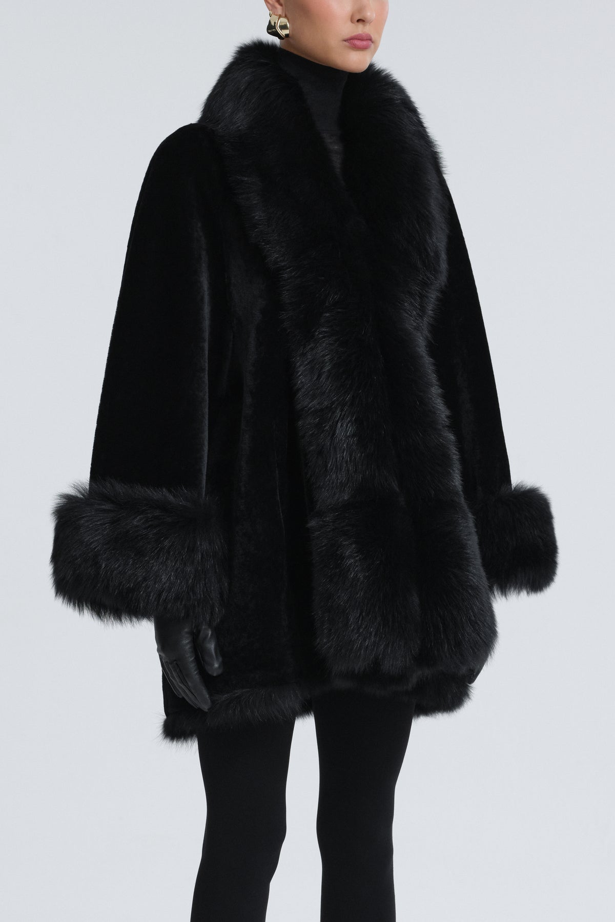 Model is Wearing Nour Hammour Sima Shearling Midi Swing Coat Black - Three Quarters
