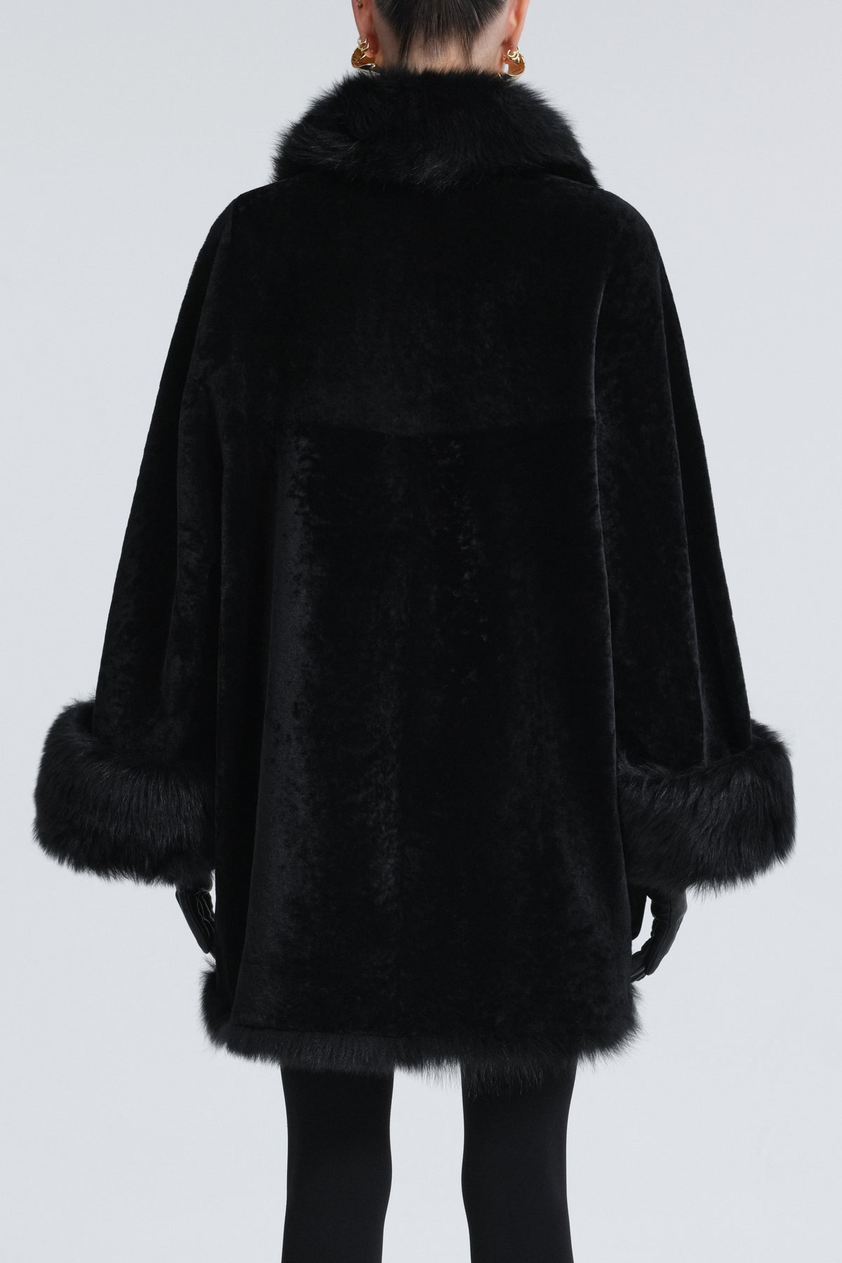 Model is Wearing Nour Hammour Sima Shearling Midi Swing Coat Black - Back