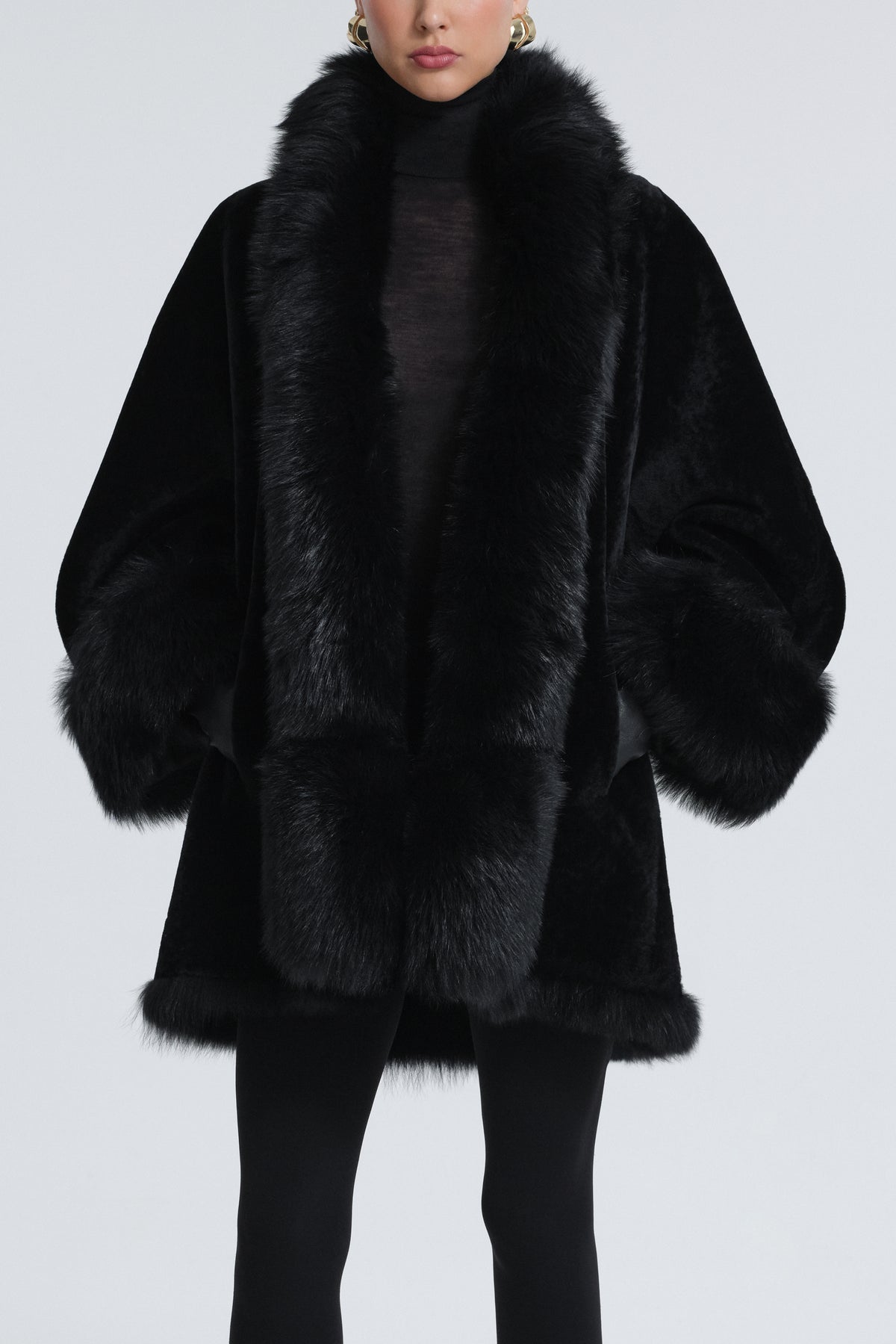 Model is Wearing Nour Hammour Sima Shearling Midi Swing Coat Black - Front Open