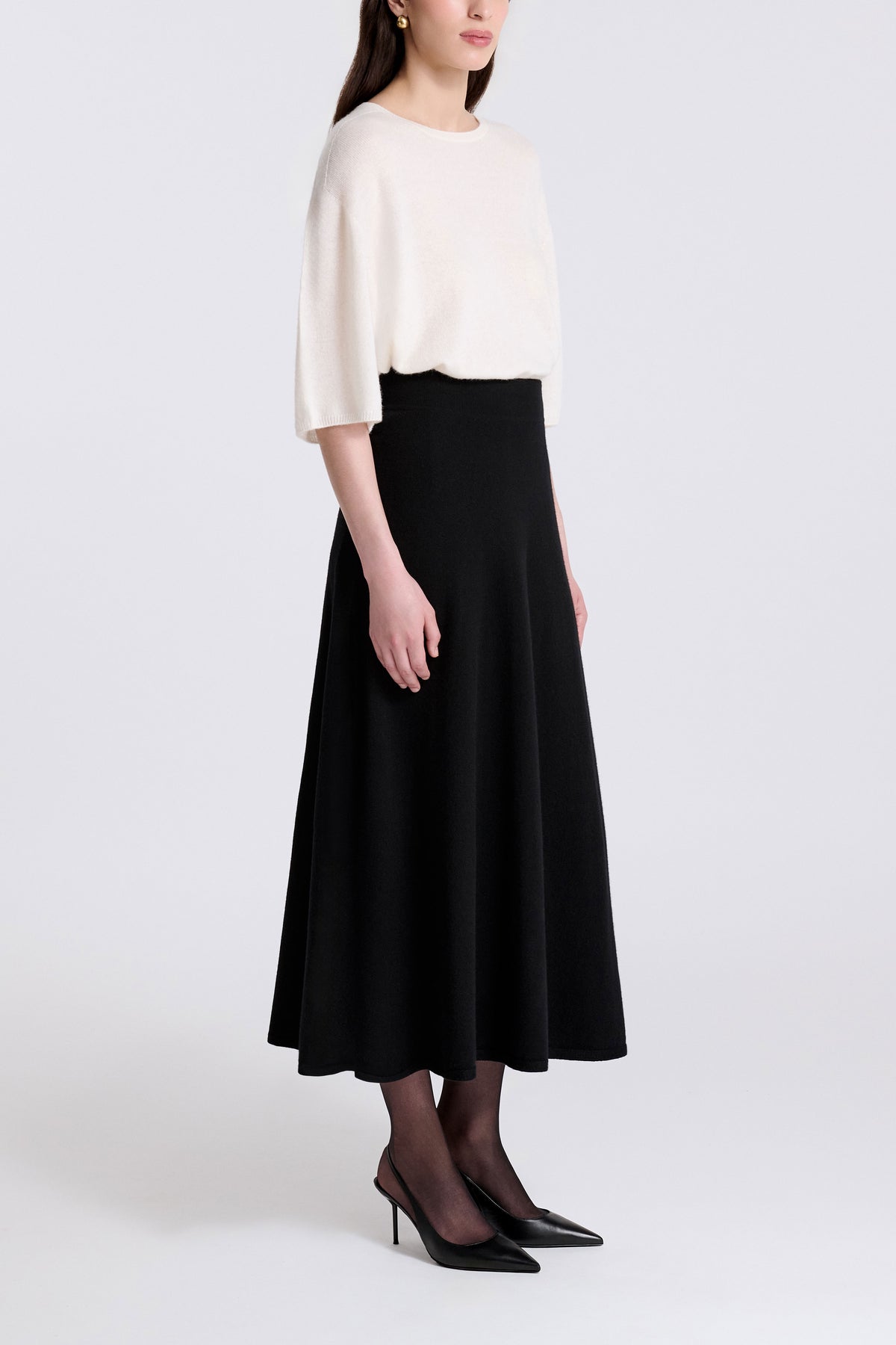 Model is Wearing Nour Hammour Sola Cashmere Fluid Midi Skirt Black - Three Quarters