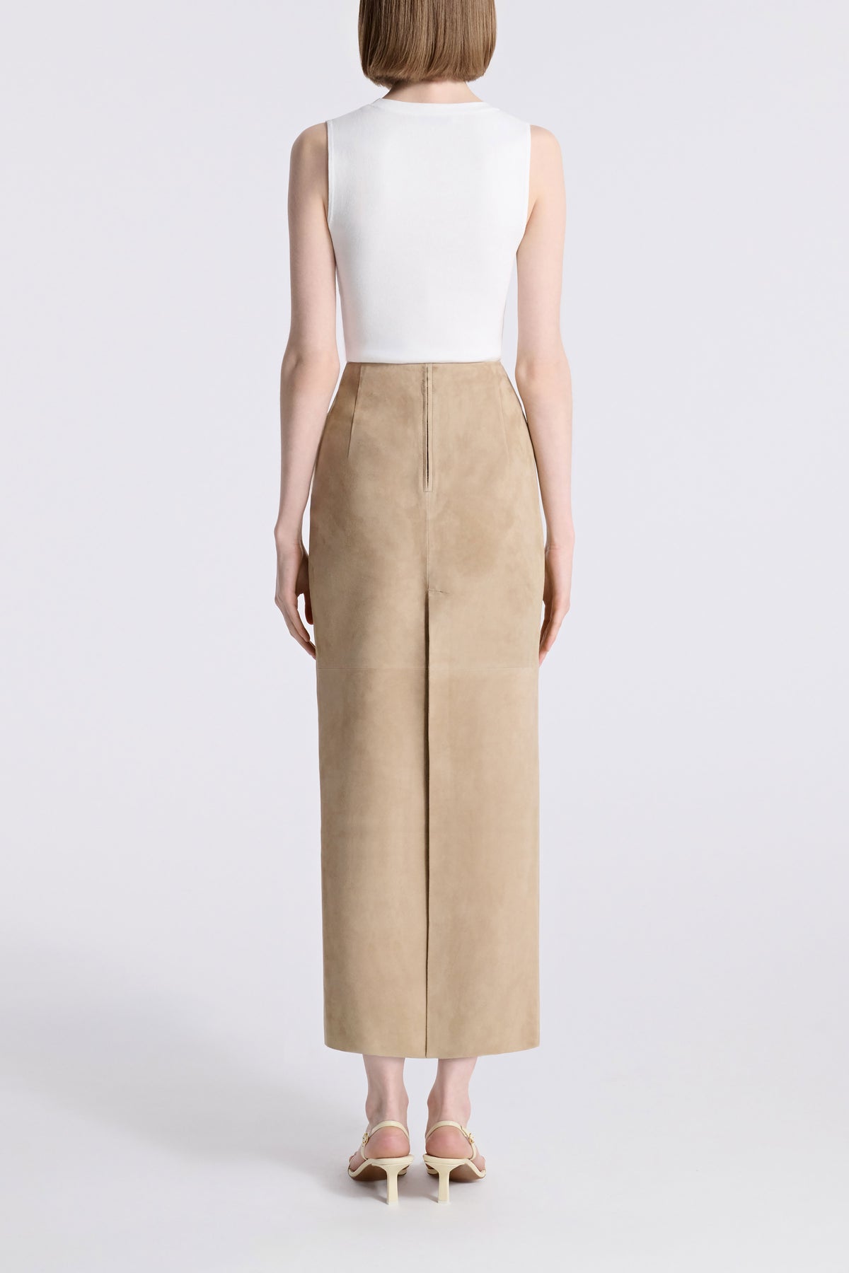 Model is Wearing Nour Hammour Selly Fitted Long Suede Skirt Creme - Back