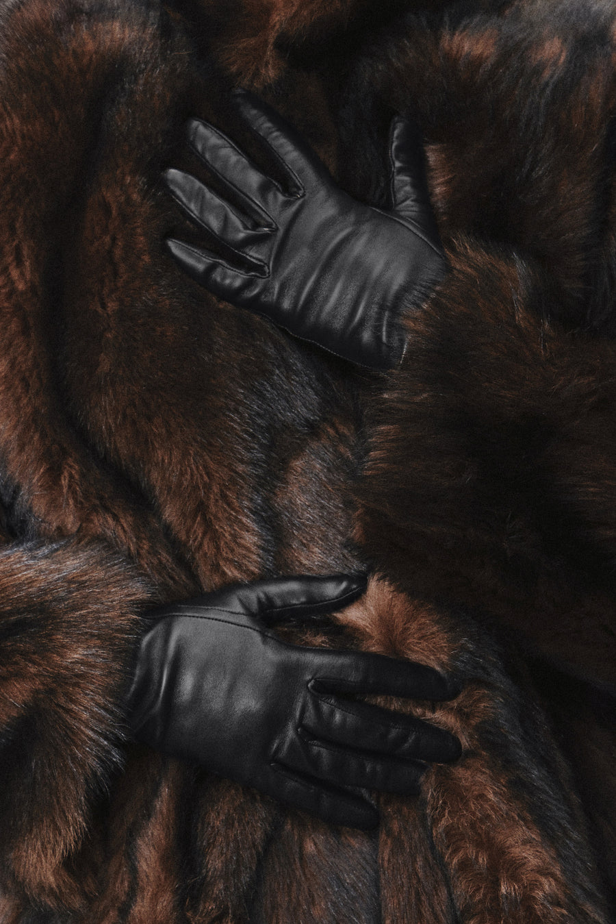 Model is Wearing Nour Hammour Wrislet Short Leather Gloves Black - Front