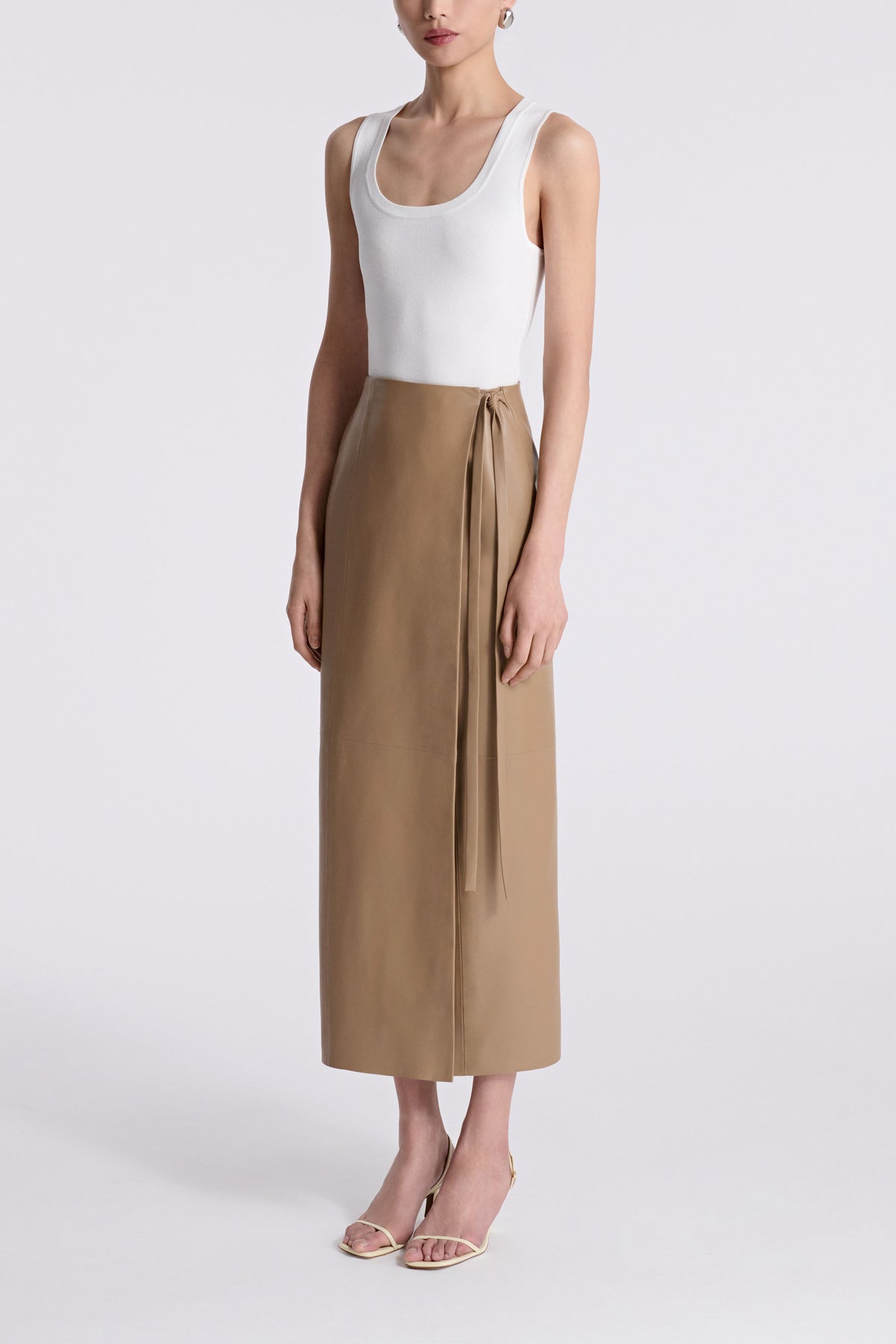 Model is Wearing Nour Hammour Wrap Tie Waist Leather Skirt Raw Camel -  Three Quarters
