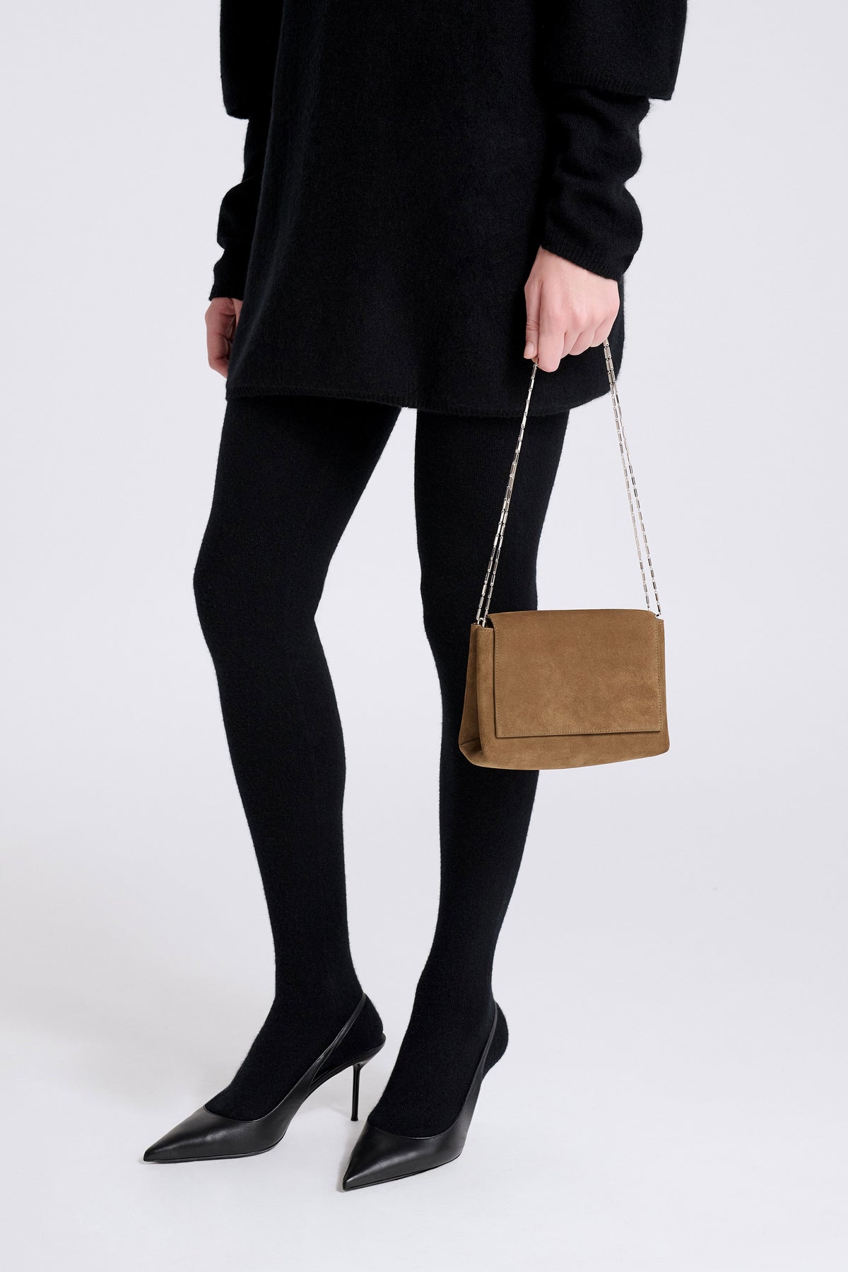 Model is Wearing Nour Hammour Zeina Jewelry Chain Bag Toffee Suede - Three-Quarters