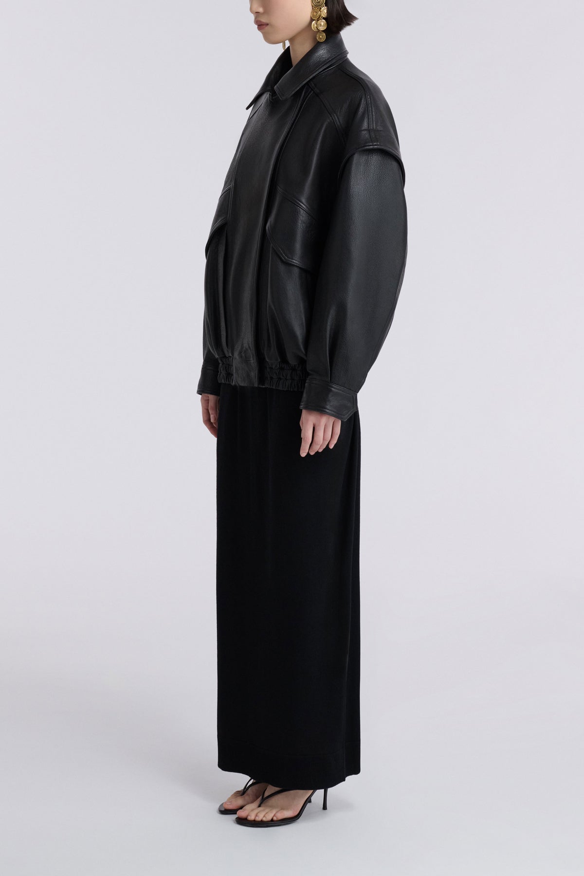 Model is Wearing Nour Hammour Micah Sumptuous Leather Bomber Black - Side
