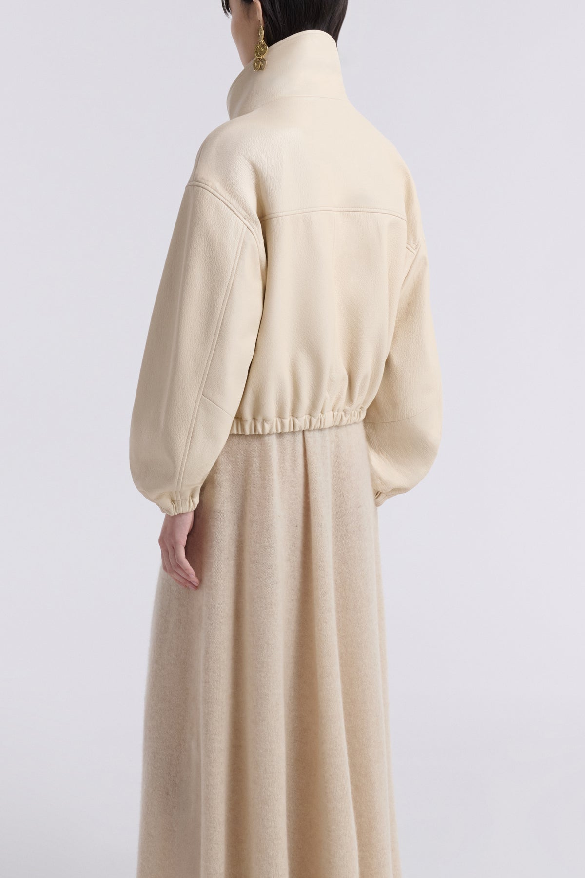 Model is Wearing Nour Hammour Pia Cropped Relaxed Leather Bomber Ivory - Back