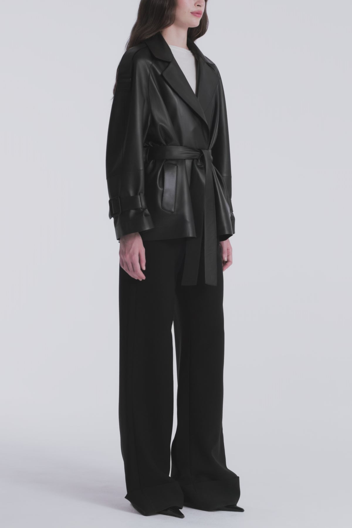 Model is Wearing Nour Hammour Nera Lightweight Cropped Leather Trench Black - Video