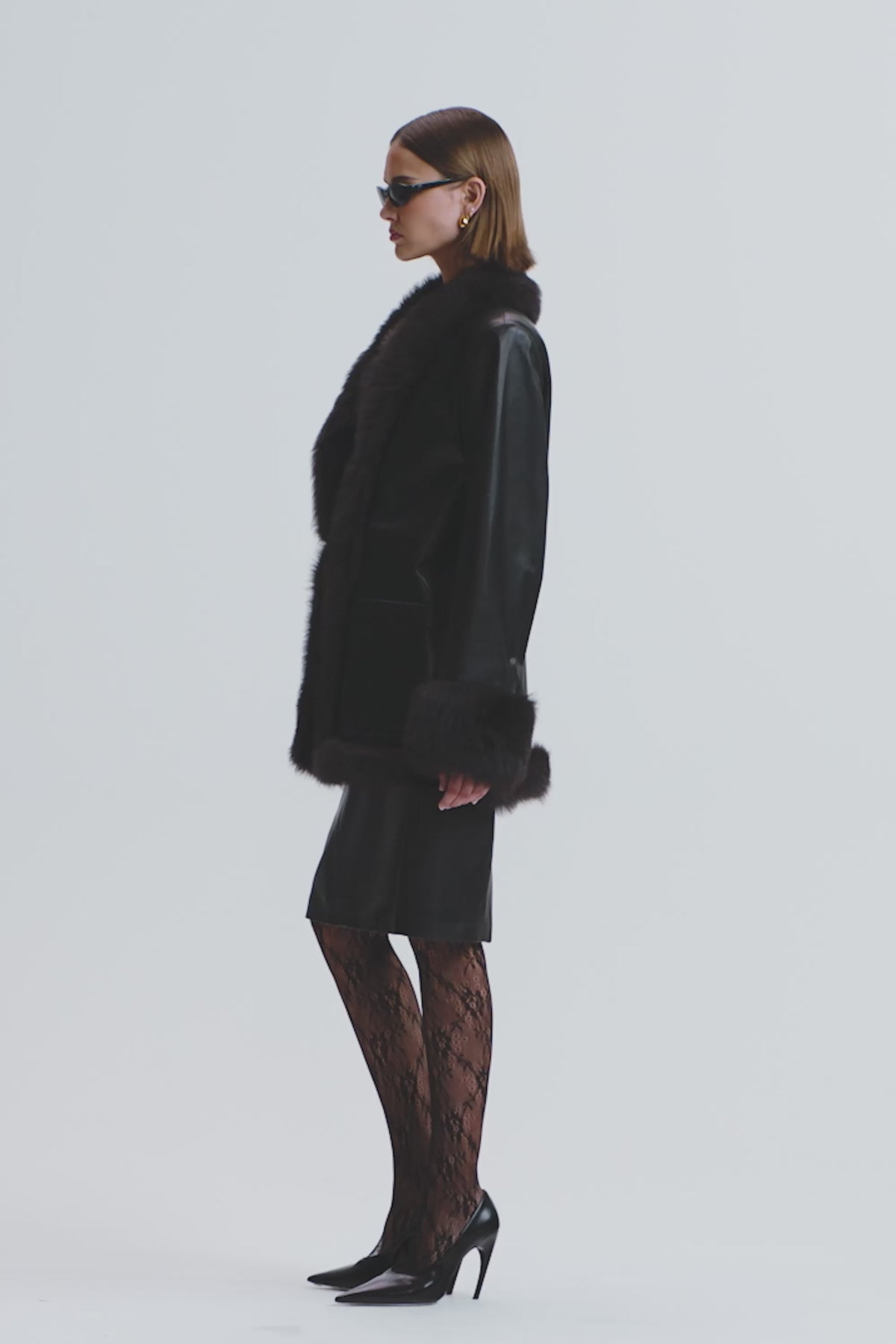 Model is wearing the Nour Hammour Phoebe Black Espresso - Elegant Leather Coat - Video