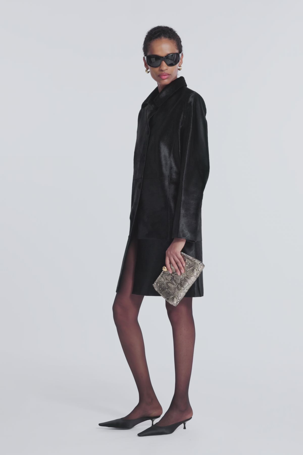 Model is Wearing Nour Hammour Stella Ponyhair Day Coat Obsidian Black - Video