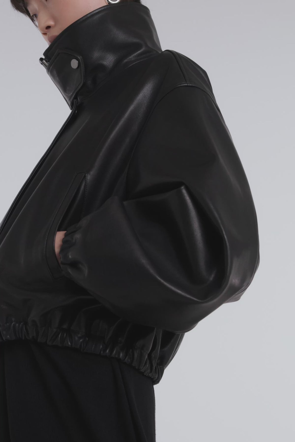 Model is Wearing Nour Hammour Pia Cropped Relaxed Leather Bomber Noir Classique - Video