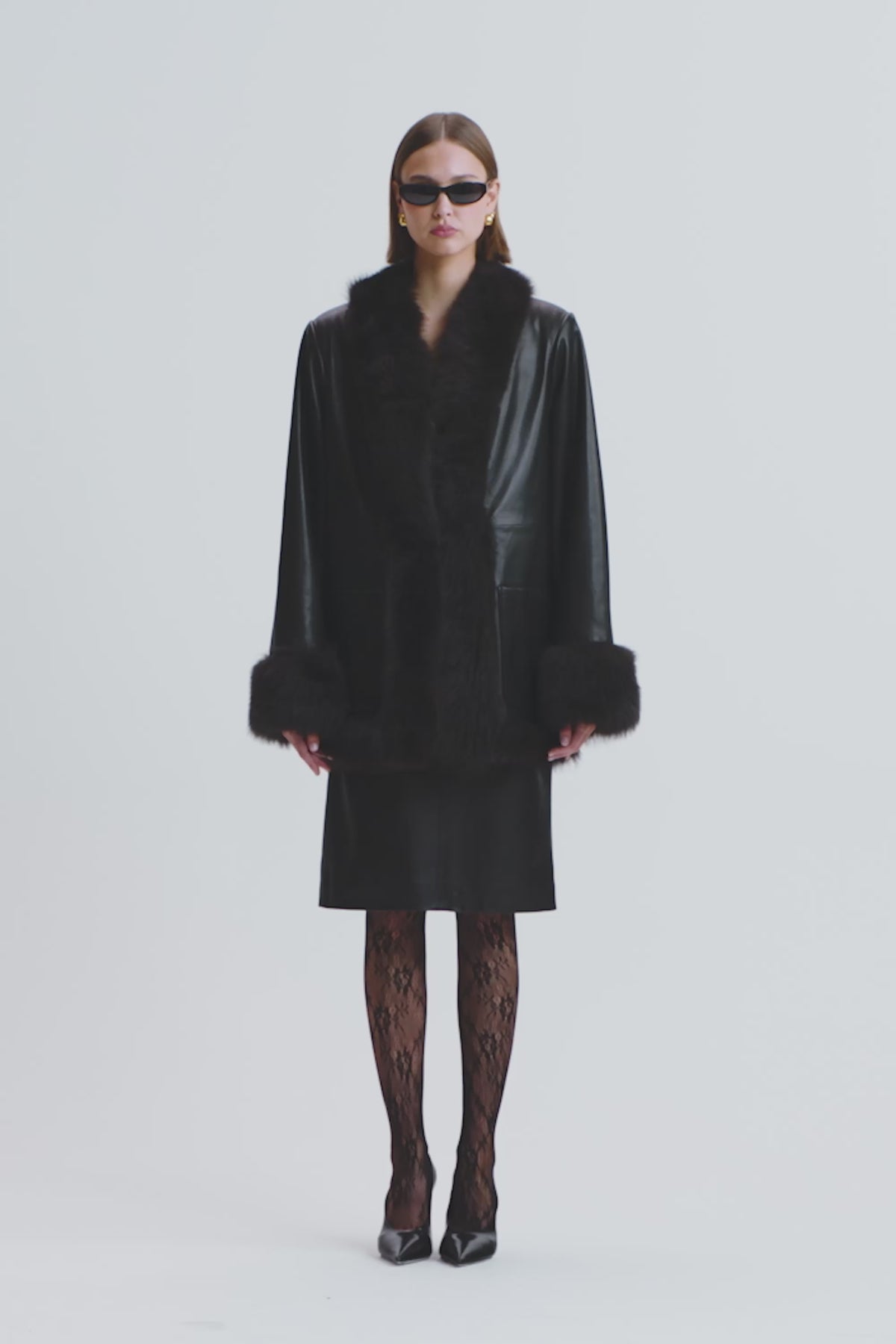 Model is wearing the Nour Hammour Phoebe Black Espresso - Elegant Leather Coat - Video