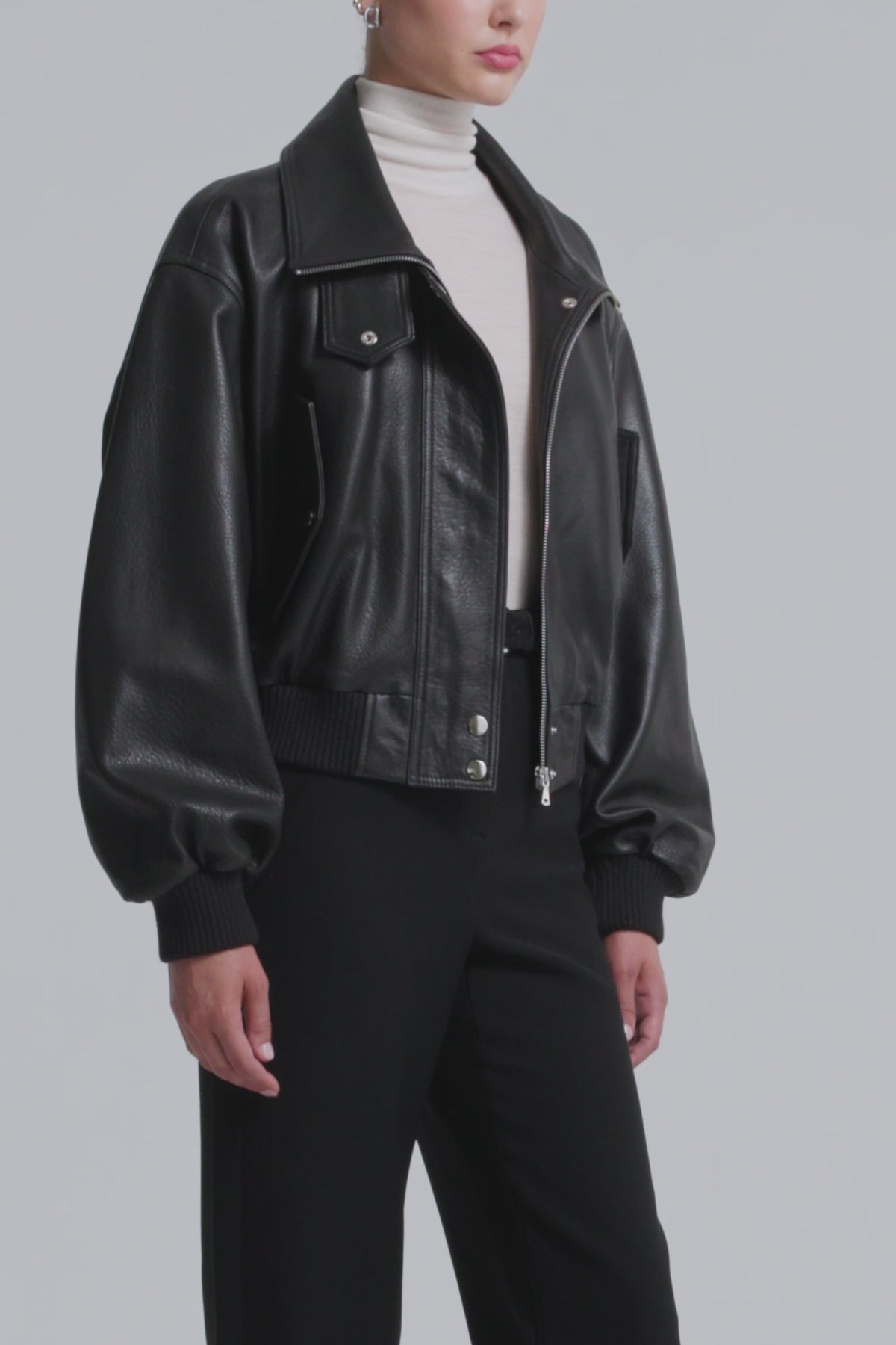 Model is Wearing Nour Hammour Briar Cropped Bomber Jacket Black - Video