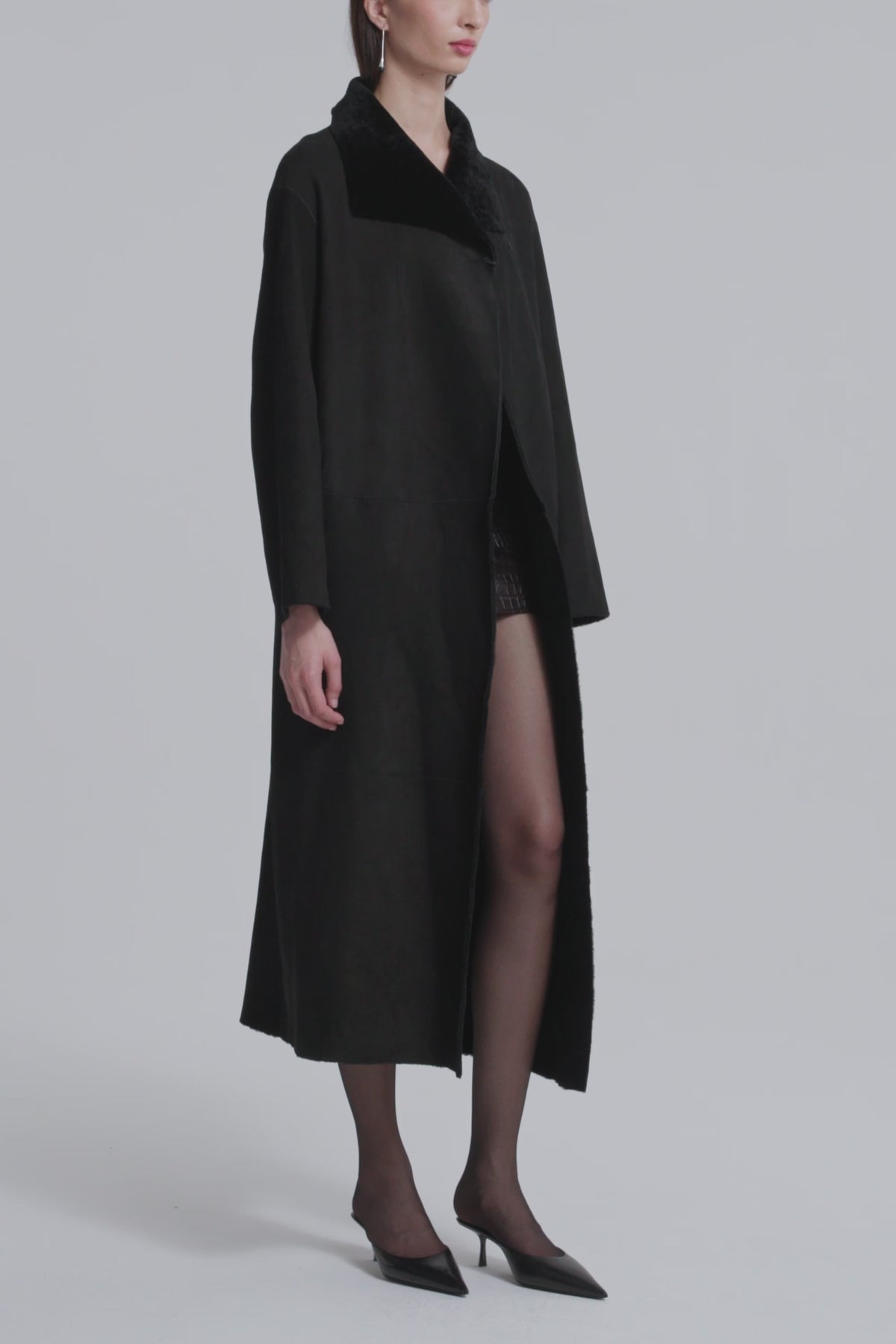 Model is Wearing Nour Hammour Birthday Coat Draped Merinos Coat Black - Video